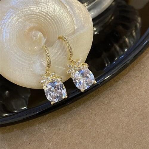 Koreas Light Luxury Temperament Micro-inlaid Bowknot Girl High-end Super Flash Zircon Earrings Women