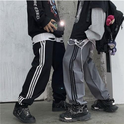 Harajuku womens loose ins retro casual pants mens and womens sports pants Harajuku style foot mouth drawstring adjustment
