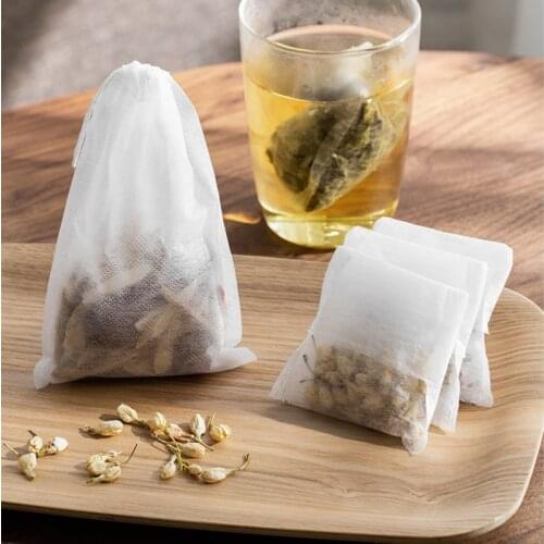 China disposable filter bags PET non-woven food grade biodegradable tea paper bag with drawstring