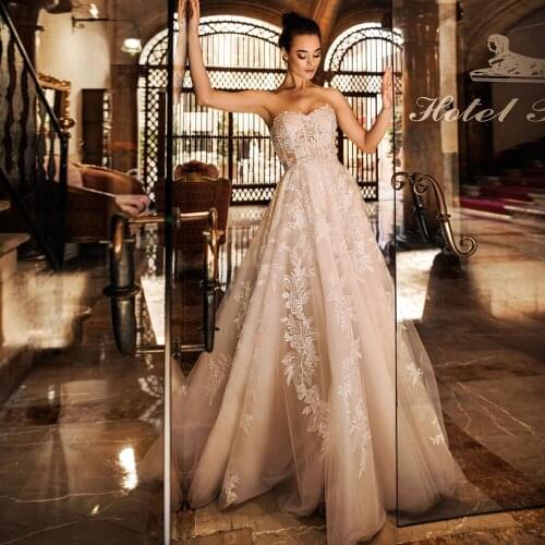 Gorgeous Strapless Lace Wedding Gown Appliqued Champagne Bridal Dress 2020 Robe de Mariee Customized Corset Bride Dress