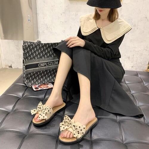2021 New bowknot womens slippers, wear Korean beach shoes, sandals, womens net celebrity ins flat shoes wholesale