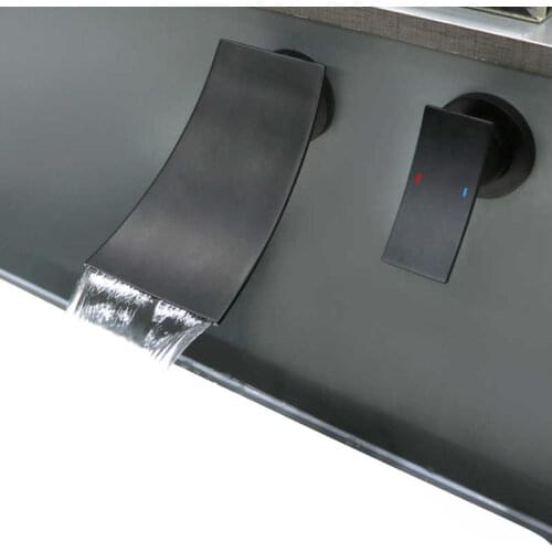 Hidden faucet taped to the black wall hot matte and cold wall faucets luxury dishwasher waterfall bathroom faucet