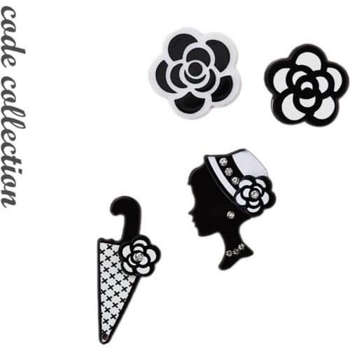 CODE COLLECTION Brooches
