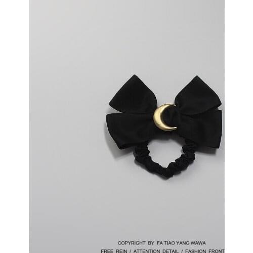 Moon bow with dark hair circle