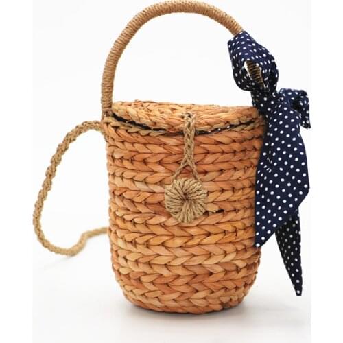 2018 Summer New Cylinder Carrying Straw Bag Wave scarf towel Woven Leisure Bag Ribbon Messenger Bag Portable Bucket