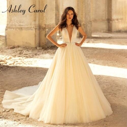 Ashley Carol A-Line Wedding Dress 2021 Classy V-Neck Beaded Appliques Bride Backless Spaghetti Straps Princess Tulle Bridal Gown