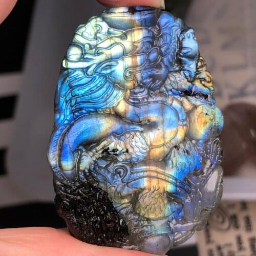 Handmade dragon pendant carved from natural Labrador minerals