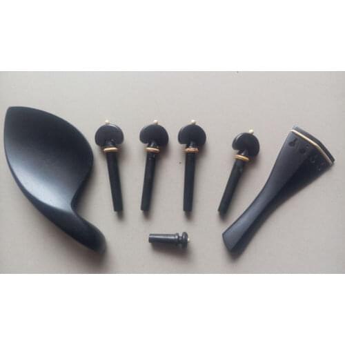 1sets violin ebony fittings 4/4(Chin rest, Tailpiece, four pegs and the endpin )