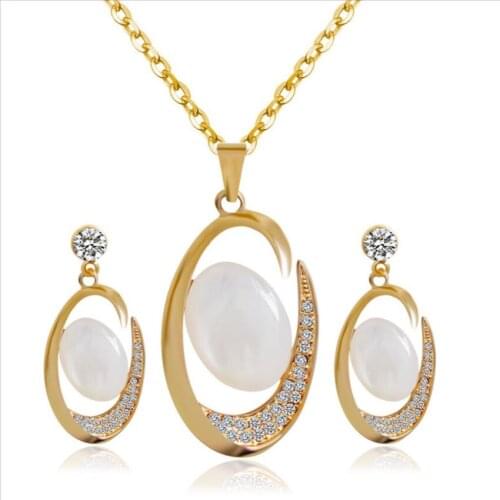 Light Yellow Gold Color Alloy Imitation Pearl Oval Hollow Pendant with Rhinestone Necklace Earrings Fashion Jewelry Sets