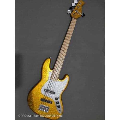 Custom - made five - string bass electric guitar, gold grain silver powder body