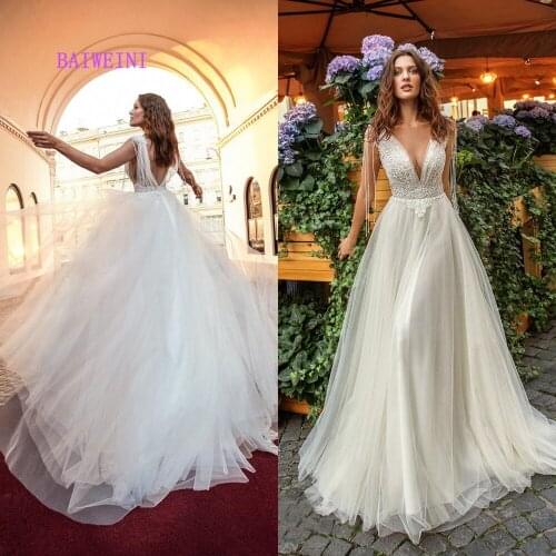 Robe de mar2021 Sexy Bohemian Embroidery Wedding Dress Deep V Neck Floral Appliques Bridal Gowns Backless Vestido De Noiva Lorie