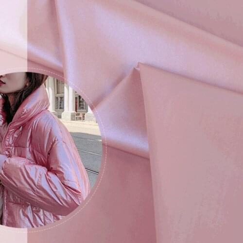 Wholesale roll 20d nylon taffeta pearlescent jacket Windbreaker fabric Symphony coat fabric holographic Windbreaker laser fabric