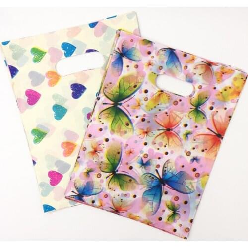 100pcs / Lot Plastic Candy Gft Bags Mix ColorButterflies and Love Plastic Bags With Handle Jewelry Packaging 15*20cm Z268