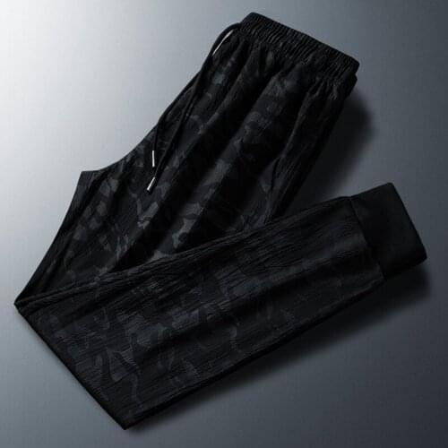 Spring and summer thin mens stretch casual pants Korean version of the trend of self-cultivation ice silk fall feeling sports p