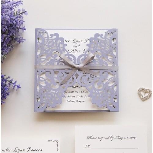 Romantic lavender laser cut wedding invitations with grey ribbon bows
