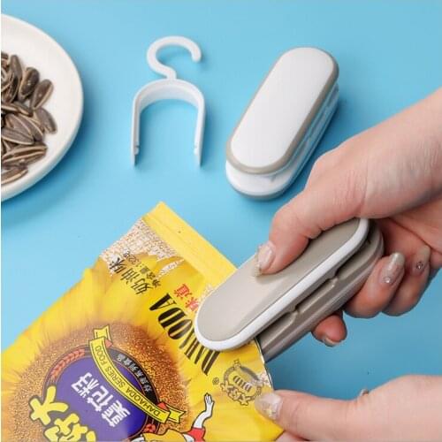 Mini Portable Sealing Machine Household Snack Bag Sealer Mini Hot Sealing Machine Snack Plastic Bag Incision Bag Vacuum Sealer