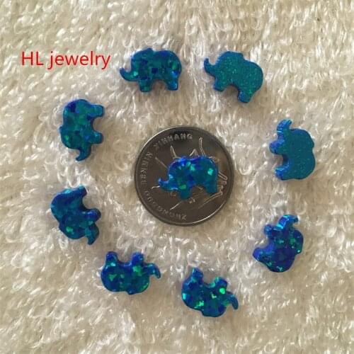Hill-san Lotus Wholesale Special Shape 8*11mm Synthetic Fire Opal Elephant