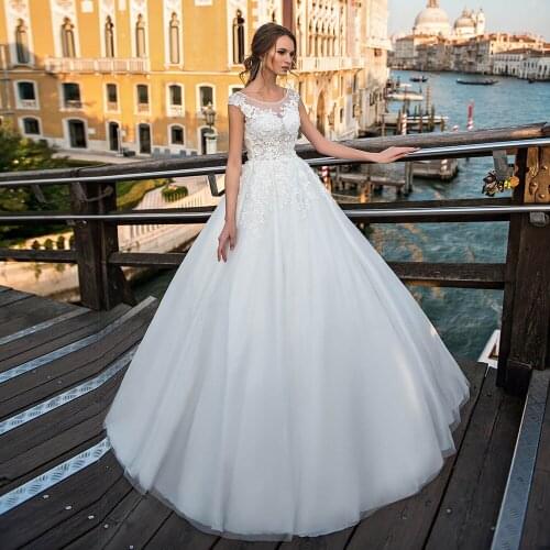 A Line O-neckline Cap SLeeves Wedding Dresses White Appliques Lace Wedding Dress Comfortable Buttons Back Sweep Train