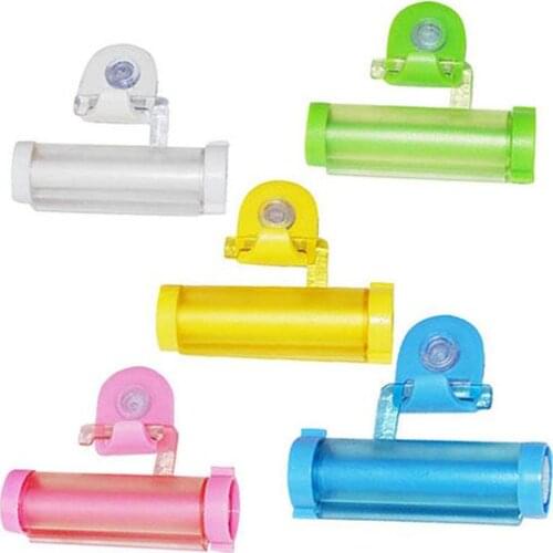 Useful Plastic Rolling Tube Squeezer Toothpaste Easy Dispenser Bathroom Holder