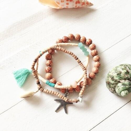 Dongmu Jewelry Boho Jewelry 2018 Fashion Summer Ocean Crystal Beads Charm Bracelet Elastic Four Leaf Clover Womens Bracelet