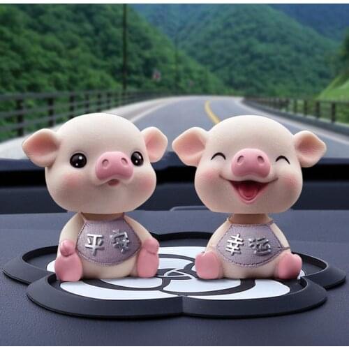 Car Accessories Center Console Decorations Shaking His Head Piggy Perfume Ornaments High-end Car Dolls New Vibrato Goddess