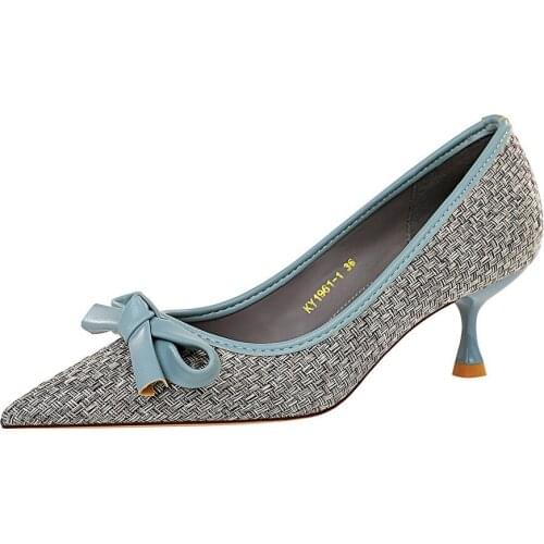 Fashionable wine glass with high heels and braided light tip and patchwork colored bow for womens shoes