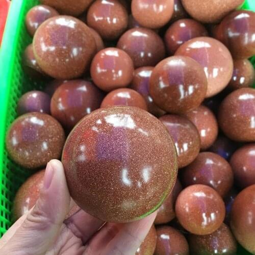 Polished Red gold sandstone sphere crystal ball
