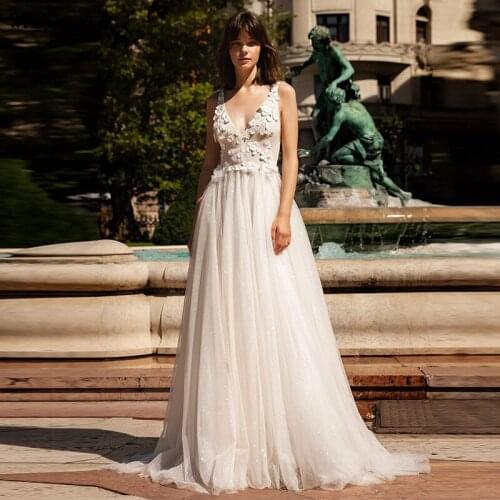 Magic Awn 2021 Shiny Princess Wedding Dresses V-Neck Backless Boho Mariage Gowns Flowers Appliques Glitter Vestidos De Novia
