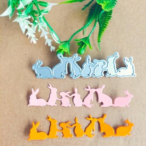 A group of cute little rabbits decorated with metal cutting die stamping die new paper jam