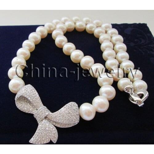 P7342-18" 10-11mm natural white round freshwater pearl necklace -Bowknot pendant