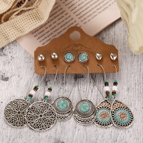 Han Zhishang European and American love hollow half round earrings 6 pairs of creative leaves and feathers retro earrings