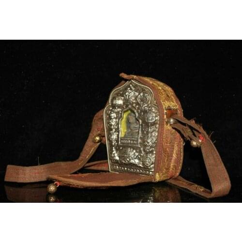 Antique collection, hand-made old black tape, wrapped in Buddha statue