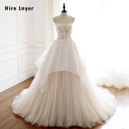 HIRE LNYER New Arrive Bridal Dresses Gelinlik Appliques Lace Beading Crystal Illusion A-line Wedding Gowns Alibaba Plus Size