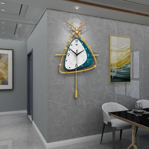 Nordic Light luxury clock wall clock living room household fashion deer head triangle wall clock special wall clock