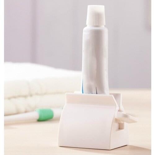 Multifunctional Bathroom Plastic Cream Tube Squeezing Dispenser Rolling Tube Squeezer Tooth Paste Squeezer Toothpaste Dispenser