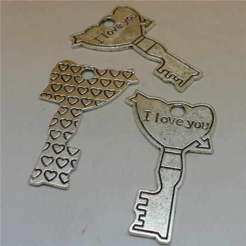RONGQING 50pcs/lot Wholesale 37x25mm I love you Cartoon Heart Pattern Key Charms