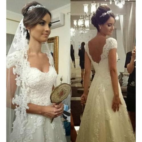 Train de chapelle A-Line White Lace appliques Long Beading Elegant Short Sleeve Zipper Bridal Gown 2021 Bespoke Wedding Dresses