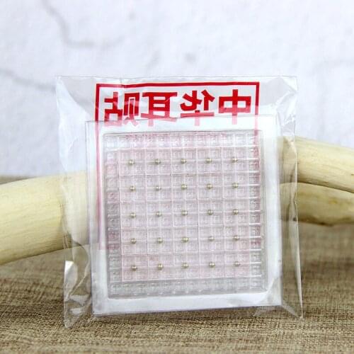 1000 pcs Chinese auricular acupoint plaster golden magnetic ear massage sticker ear seed