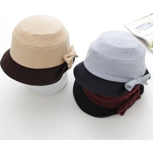 Free shipping High Quality Casual Woman Fedoras Wool Bucket Caps Classic Handwork Bow Patchwork Short Brim Round Caps Bowler Hat