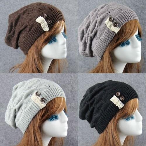 MingJieBiHuo Autumn and winter new fashion pure hand-woven 2 small silver buttons knitted Leaf lace button wool warm hat