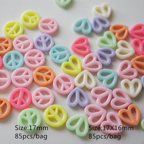 Meideheng Acrylic Hollow out heart shape Circular anti-war sign pink for Childrens jewelry accessories making 17mm 85pcs/bag