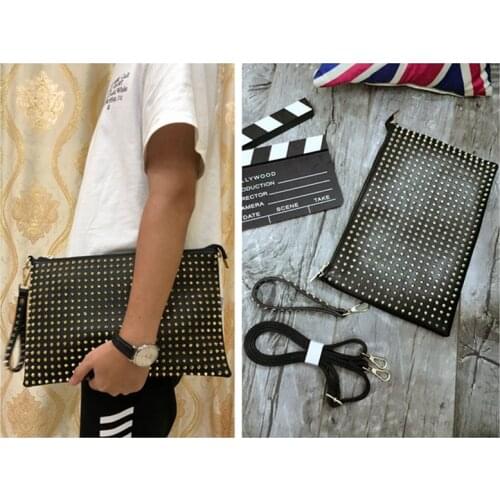 European and American fashion casual mens and womens real leather bag personality rivet hand with a bag folder hand bag should