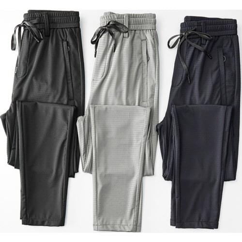 Thin Summer Joggers Men Mesh Ice silk Stretch Streetwear Sport Casual Pants Drawstring Joggers For Men Black 2021 New
