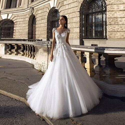 White V-neck Applique Lace Beading A-line Backless Wedding Dresses With Cap Sleeves Tulle Court Train Wedding Gowns Bride Dress
