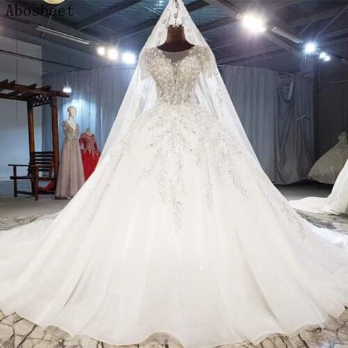 Plus Size Wedding Dress Ball Gown with Long Train 2021 Wedding Gown for Bride Dresses Robe Mariee Short Sleeve Lace Up Back