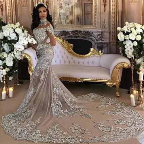 WUZHIYI Dubai African Mermaid Wedding Dresses Champagnes With Sliver Appliques Pearls Bridal Gowns Long Sleeves Illusion Dress
