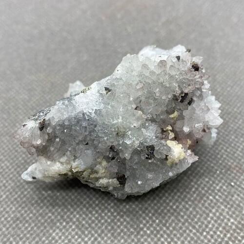 Natural red crystal coexists with chalcopyrite