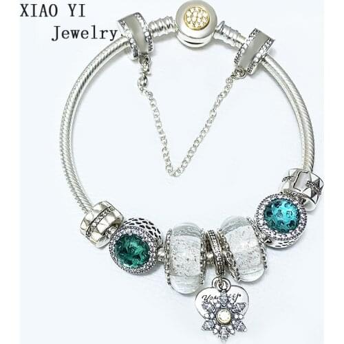 XIAOYI 100% of the 2019 Winter S925 11popular Christmas charm flower snowflake temperament bracelet fashion woman Senior wedding