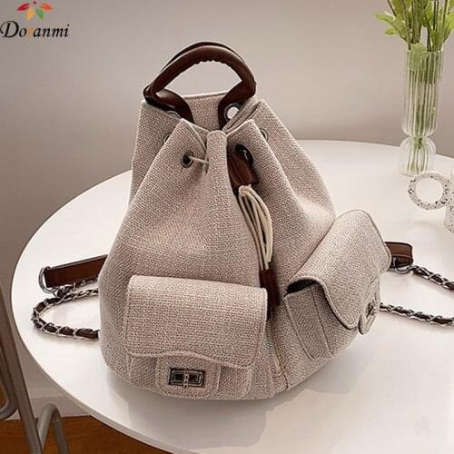 DORANMI Canvas Schoolbag Womens Backpacks 2021 Luxury Brand Designed Back Book Bag Female Rucksacks String Closure Mochila G995