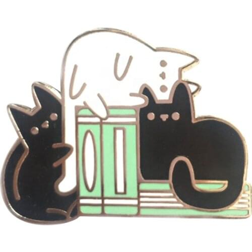 Cats sitting on bookshelf enamel pin super cute literary bookworm decor